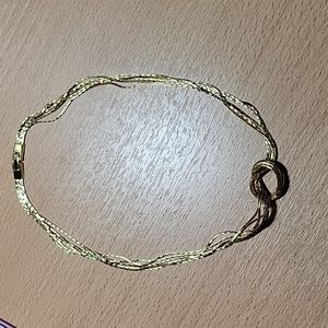 Multi Stand Love Knot in Gold Tone